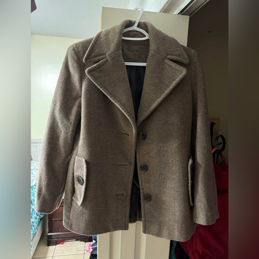 Wool , oat colored women’s jacket.